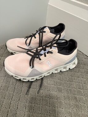 On Running Women’s Cloud Sneaker in Light Pink and Black Trim